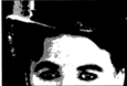 Haut du visage de Charlie Chaplin.