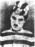 Charlie Chaplin en prisonnier.