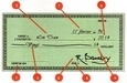 Un chèque et ses parties identifiées de 1 à 8.